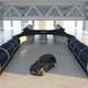 An SUV gives a sense of the machines’ scale.
